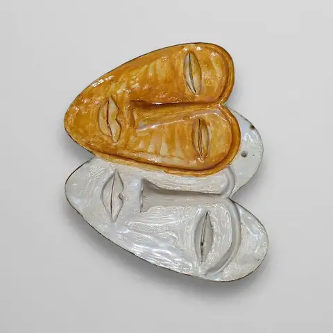 Stacked amber and white face masks